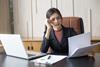 Asian woman working hard with serious emotion at office, woman working hard concept.