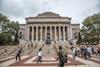 A photo of students outside the library of Columbia University