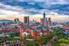 A photo of the Taipei city skyline behind the National Taiwan University.