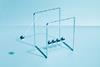 An image showing Newton's cradle in motion