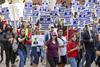 People on a protest. Their placards read UAW on strike.