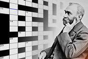 Alfred Nobel superimposed on a crossword grid